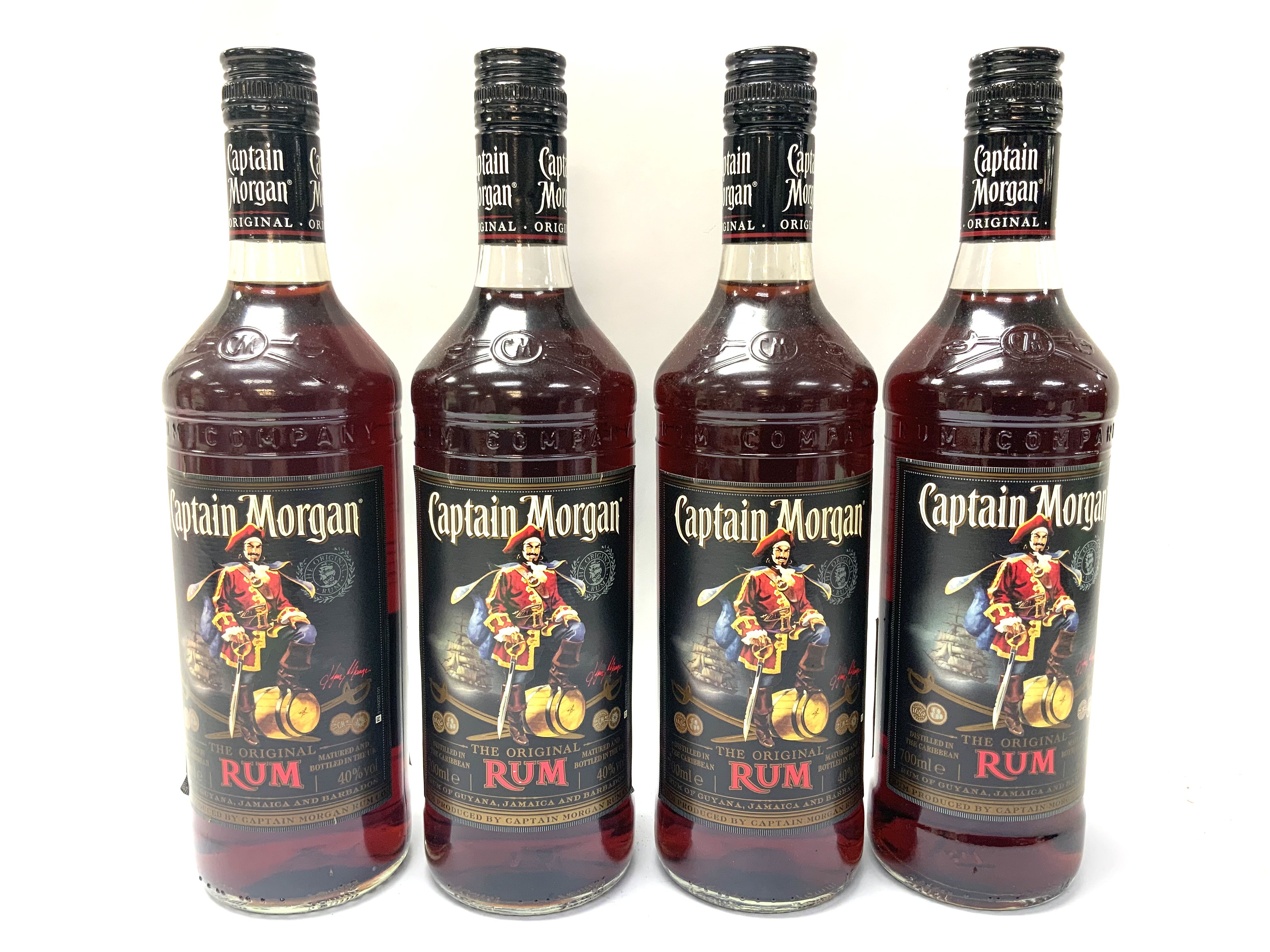 4 bottles of Captain Morgan Rum. (D)