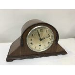 A walnut mantel clock and a canteen of cutlery (2)