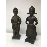 Two Dutch bronzed figures fire companies set with