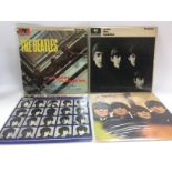 Four early UK pressings of Beatles LPs comprising