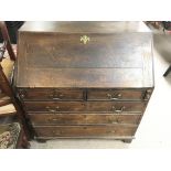 A George III oak bureau. 92 wide 51 deep 100cm hig