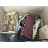 A box containing silver plated cutlery and other d