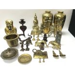 A collection of mainly brass items including candl