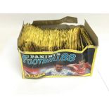 An open box containing unopened panini 88 football