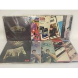 A collection in two bags of Beatles compilation LP