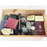 A box of assorted items including punctual attenda