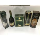 Five bottles of alcohol comprising a 70cl Remy Mar