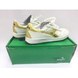 A boxed pair of Diadora Elite trainers, UK size 8.