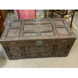 A 1920s Oriental Camphor chest with carved panels.