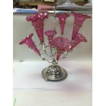 A silver plated cranberry epergne.
