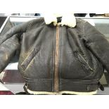 A vintage sheep skin flying jacket. Some areas of