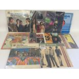 Thirteen Kinks compilation LPs and a 12inch single