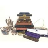 A collection of silver plate including boxed knive