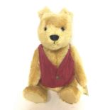 20 inch extra large Winnie Pooh Steiff, with bag.