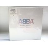 A sealed Abba 8LP box set on 180g coloured vinyl.