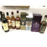 Collection of alcohol including whisky cognac and