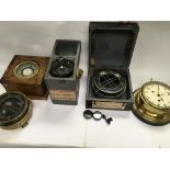 A collection of assorted ship compasses etc. posta