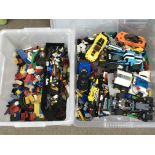 A collection of assorted Lego pieces including car