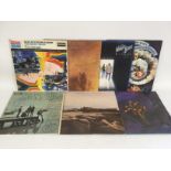 Seven Moody Blues LPs.