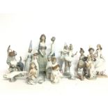 A collection of various Lladro figures, postage ca