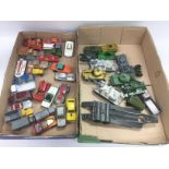 Three trays of playworn die cast vehicles. Shippin