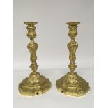 A Pair of Ormolu Candle sticks of Louis XV style w