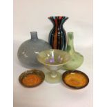 A collection of art glass including three vases an