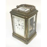 A brass cased carriage clock with strike repeat st