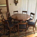 A William VI Rosewood dining table with a set of e