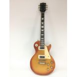 A Gibson Les Paul Deluxe electric guitar. Serial n