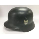 A WW2 German helmet. Shipping category B.
