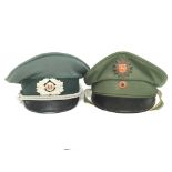 West German Police cap and a later German example