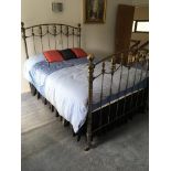 A refurbished Victorian bed brass and steel bed de