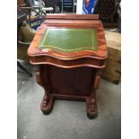 A 20th century Yew wood davenport desk with a leather top the side with a flight of drawers.