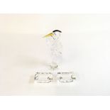 A Swarovski Silver Crystal Stork in original box. Plus 2 Swarovski , wonders of the seas, paper