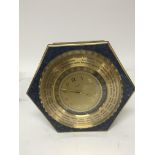 A Luxor 8day world clock brass and polished stone