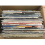 A collection of LPs by various artists including C