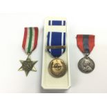 Three medals comprising an italy Star, a Yugoslavi