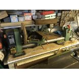 A Nutool Bench top wood turners lathe sold with some accessories single phase electric. Viewing by