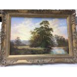 A gilt framed oil painting of a rural view with sh