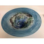 A large art glass blue Monart cloud bowl 40 cm .