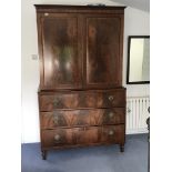 A late George III mahogany linen press the top sec