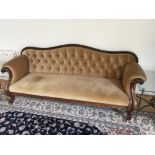 A large Victorian walnut sofa with button back uph