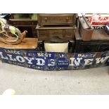 A large Lloyds News Enamle sign. Approximately 96