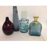 A collection of four art glass of various colour a