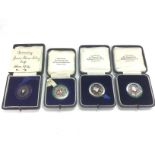 Four cased 1930s silver and enamel medals from Sou
