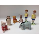 A small collection of Disney Winnie the Pooh Beswi