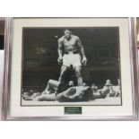 A framed and glazed signed photo of Muhammad Ali w