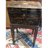 A Victorian coromandel vanity box brass bound with