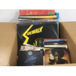 A box of mainly 1980s 12inch and 7inch singles. NO